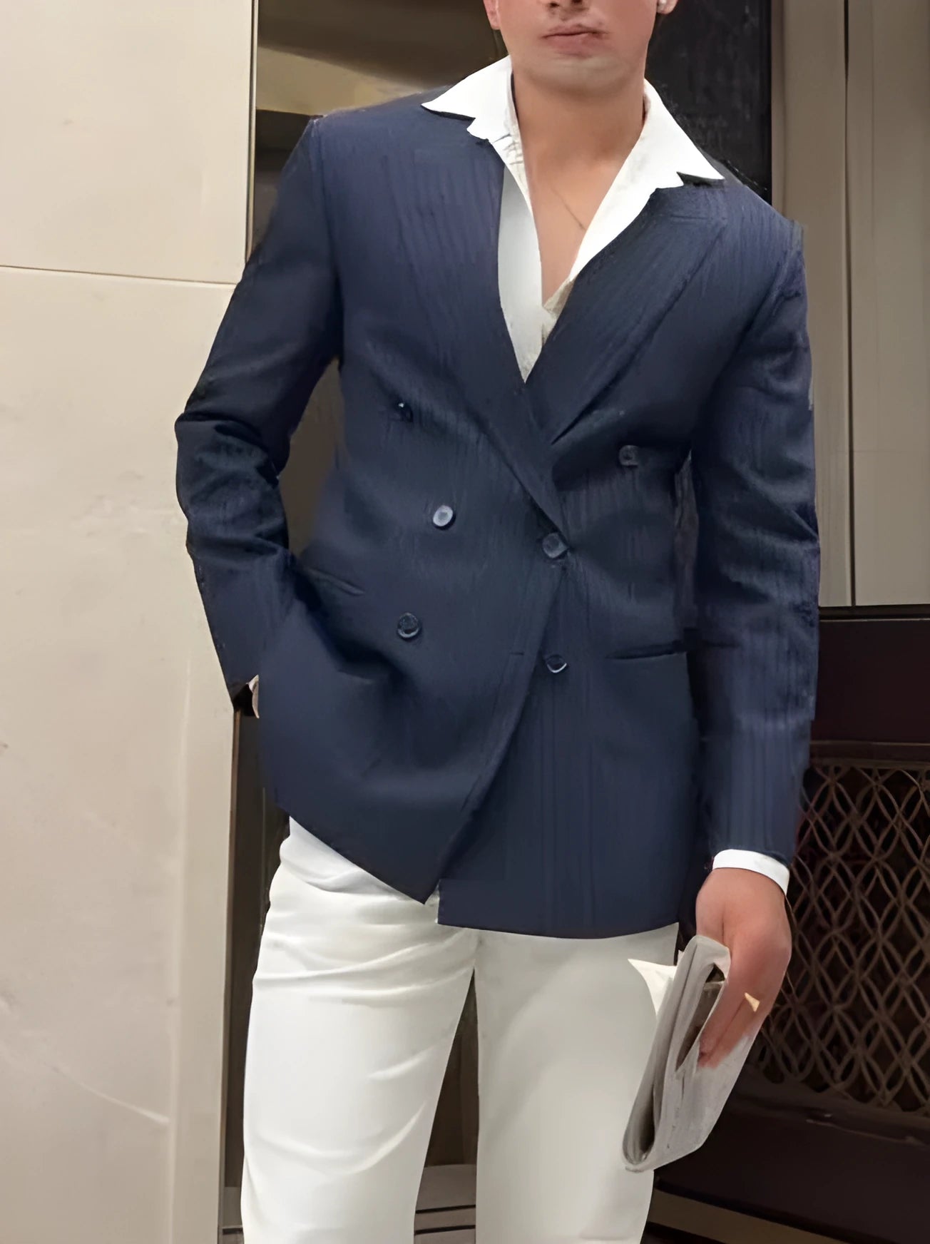 Men's classic striped double breasted blazer on a hanger