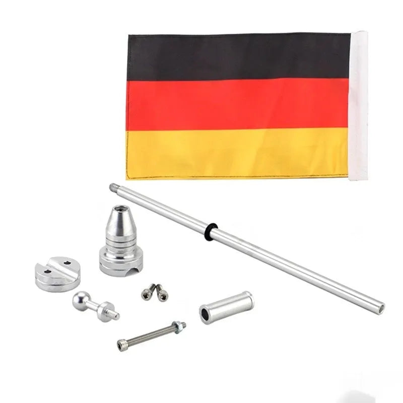 Silver electroplated tail box flagpole mounted on commercial vehicle parcel rack with German flag