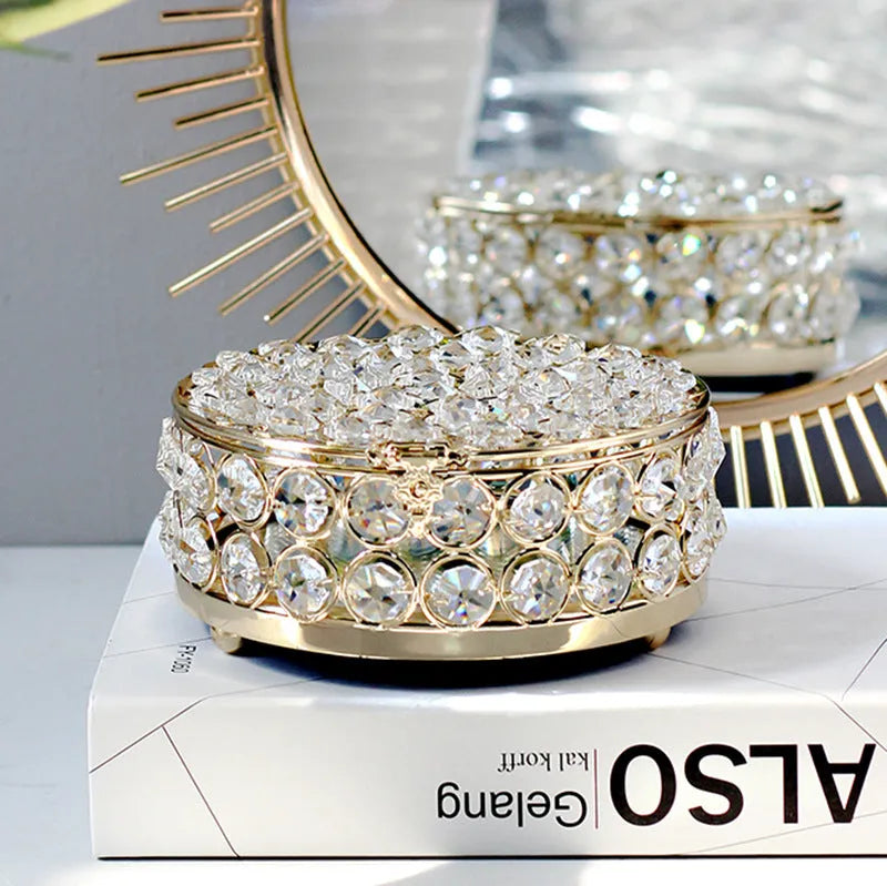 Crystal glass jewelry storage box with transparent sides and French gold metal frame