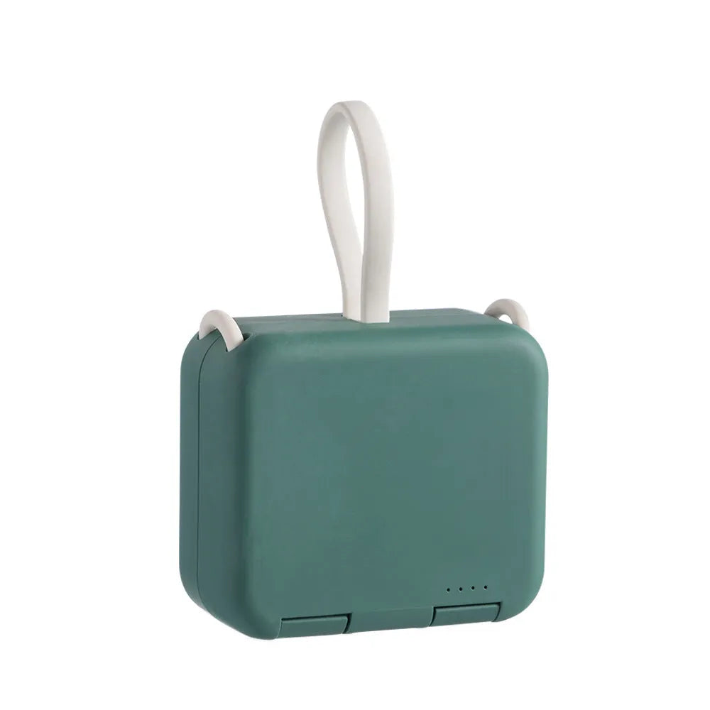 Handbag back clip power bank in blue, showing clip and dual USB charging ports