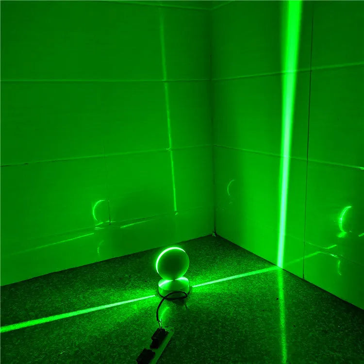 Modern aluminium LED bar wall lamp with glass lens, shown in a corridor setting.