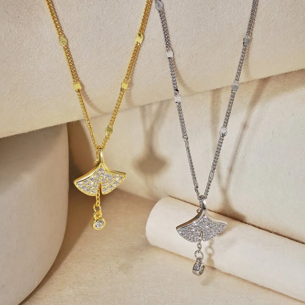 S925 sterling silver necklace with ginkgo leaf pendant in gold finish on curbs chain for women