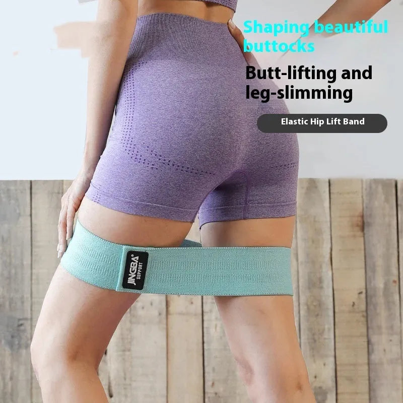 Polyester cotton resistance band in pink, green, or purple, sizes M 66cm, L 76cm, XL 86cm, with small medium large resistance.