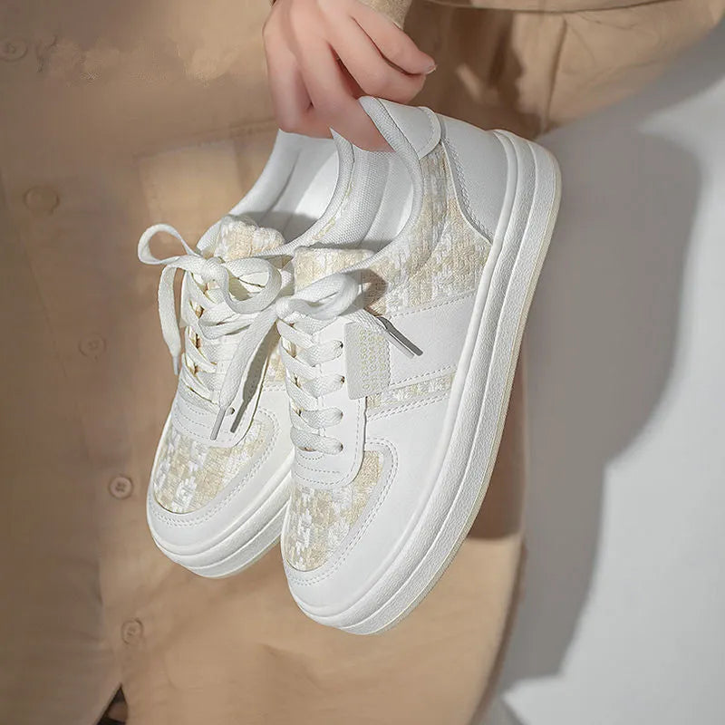 Beige plaid platform sports shoes with mesh lining and a white rubber sole.