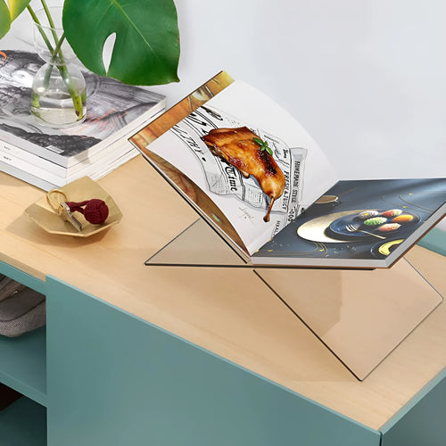 Clear acrylic X-shaped desktop book display rack holding books and magazines