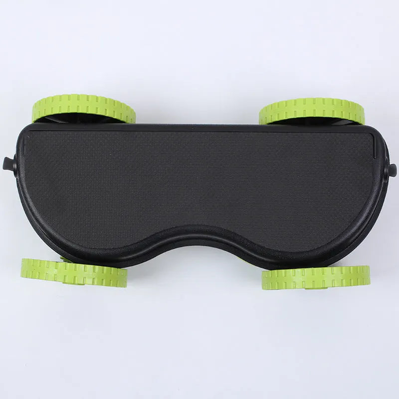 Double-wheeled green abdominal rally wheel with pull rope on floor for core exercises