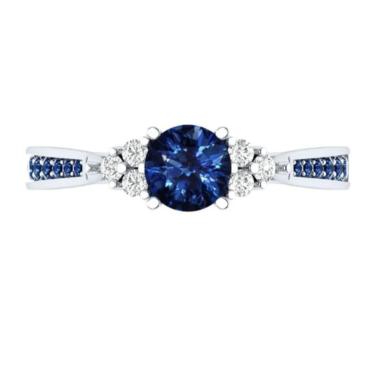 New inlaid sapphire zircon ring in 925 silver princess engagement ring on display