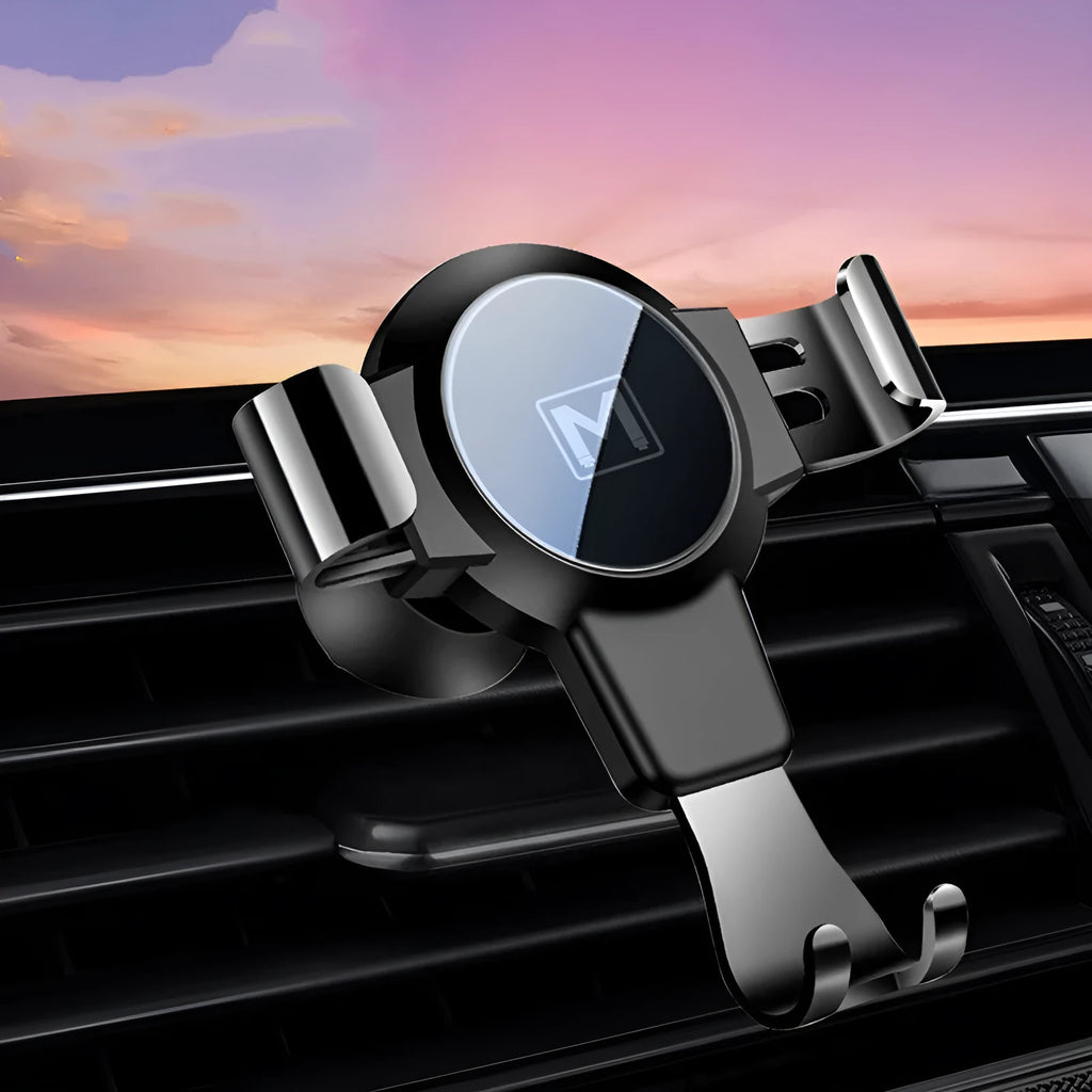 Black ABS car phone bracket mounted on vehicle air conditioning port holding smartphone