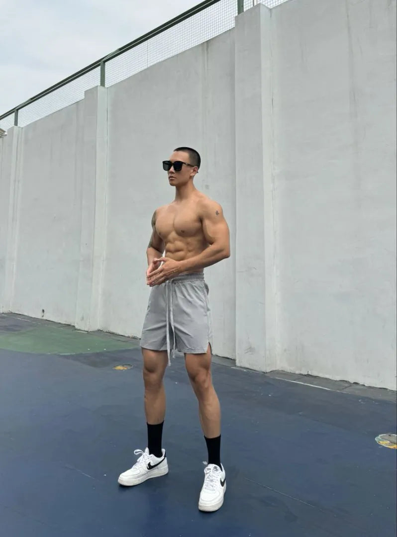 Men's ice silk quick-drying double-layer shorts in six colours with quarter-length design