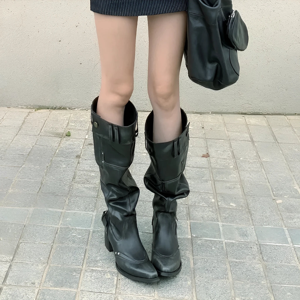 Black pointed toe chunky heel slimming boots with leather lining and high cylinder sock, side view on white background