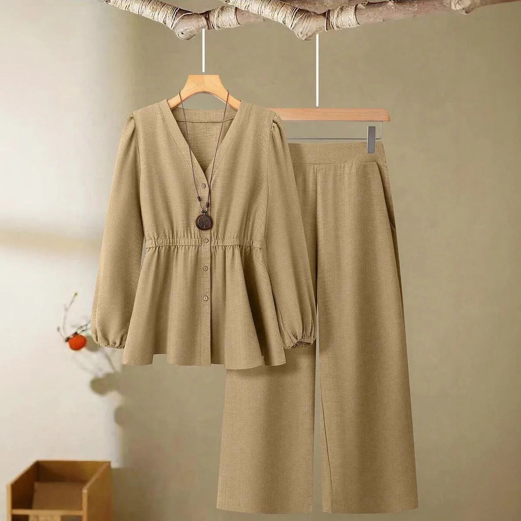 Women's woven polyester two-piece suit in wine red with button-front long-sleeved top and matching full-length trousers