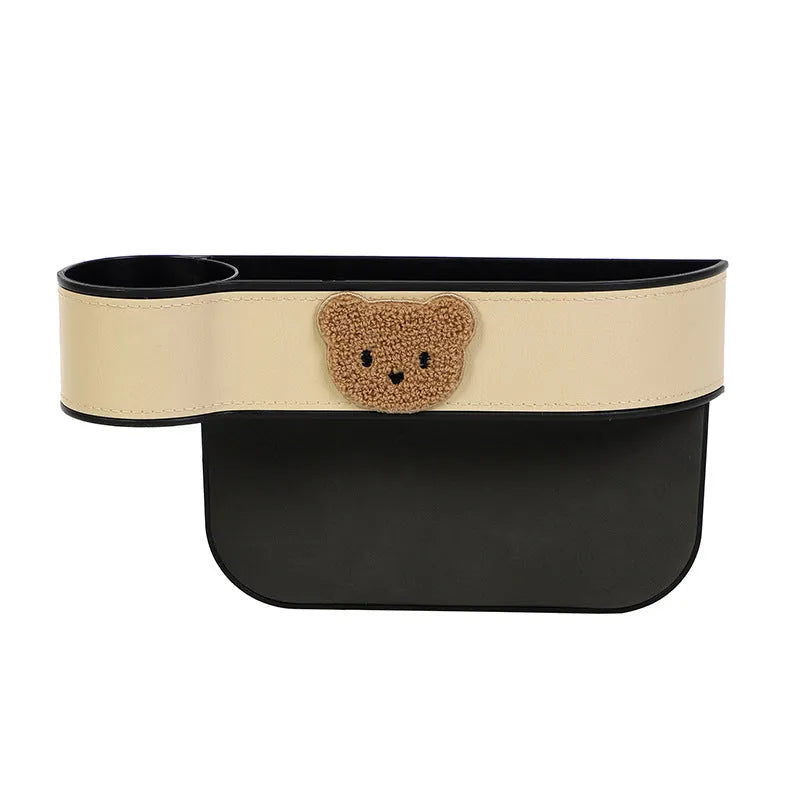 Leather car seat gap storage box with cartoon bear design hanging between vehicle seats