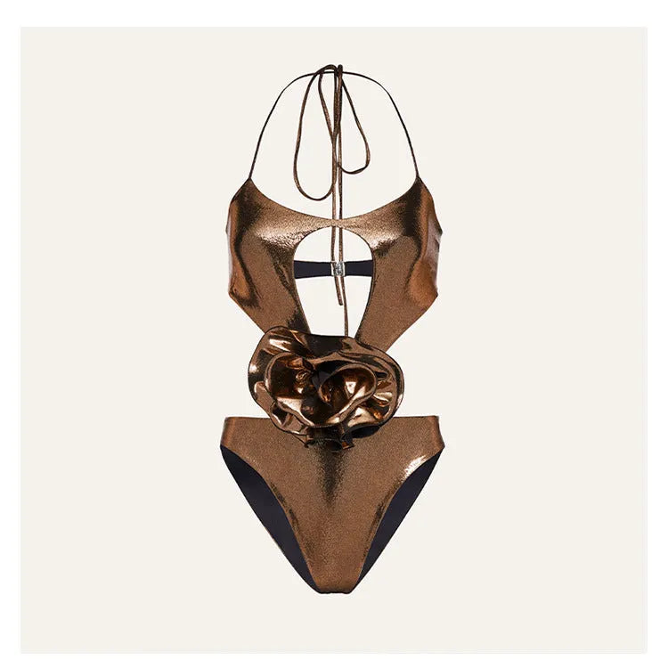 Gold halter one-piece swimsuit with hollow out design on mannequin