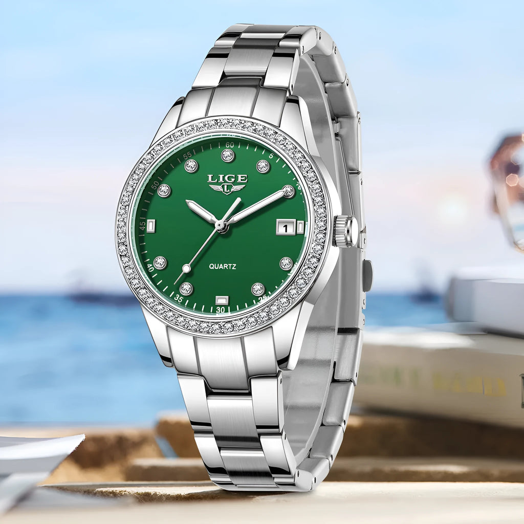 Silver Fashion Girl watch with round diamond-encrusted dial on stainless steel strap, showing luminous hands.