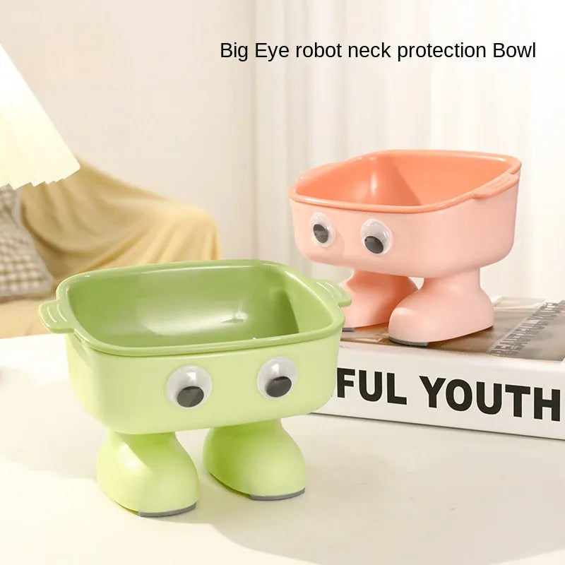 Green robot-shaped elevated cat bowl with tilted food surface and non-slip base