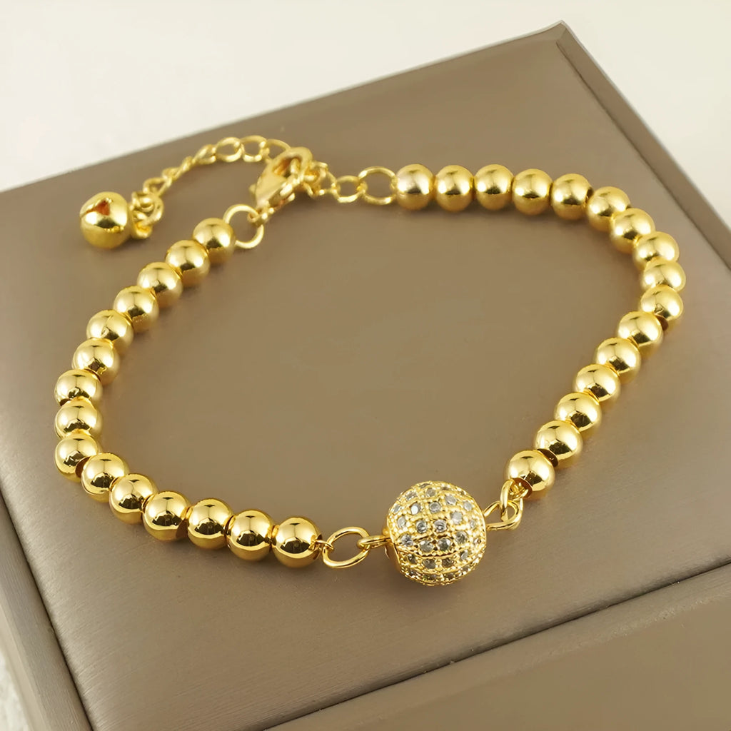 Women's Arabic-style copper bracelet with a heart shape and single zircon ball accent.