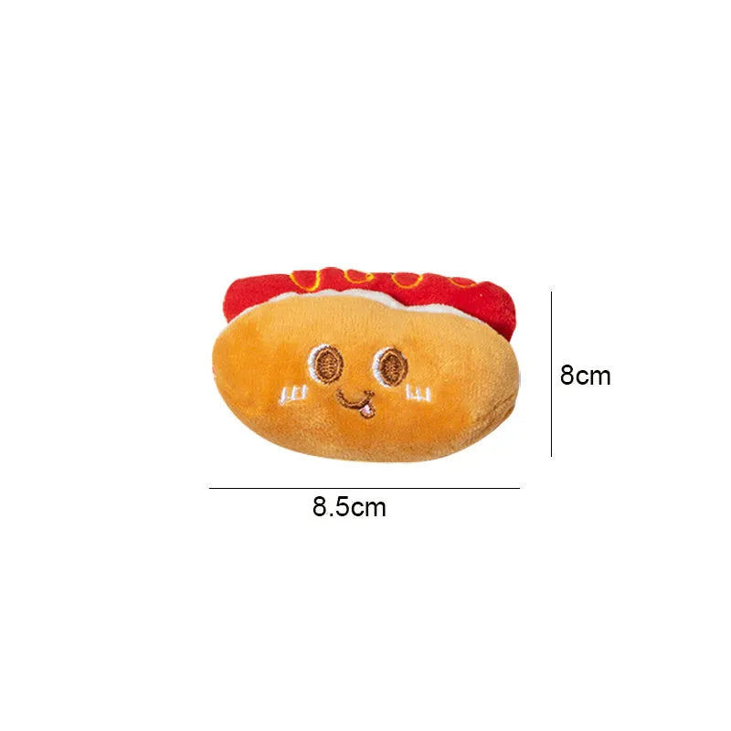 Five soft chew toys for kittens shaped like hamburger, chicken leg, fries, bread, and hot dog