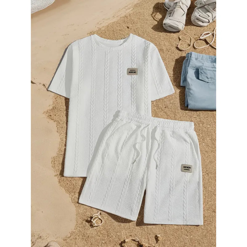 Men's wheat grain tassel knit two-piece set: grey hooded sweatshirt and matching shorts, front view on model