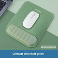 Ergonomic mouse pad with wrist rest in cloth silicone construction showing colour pattern options