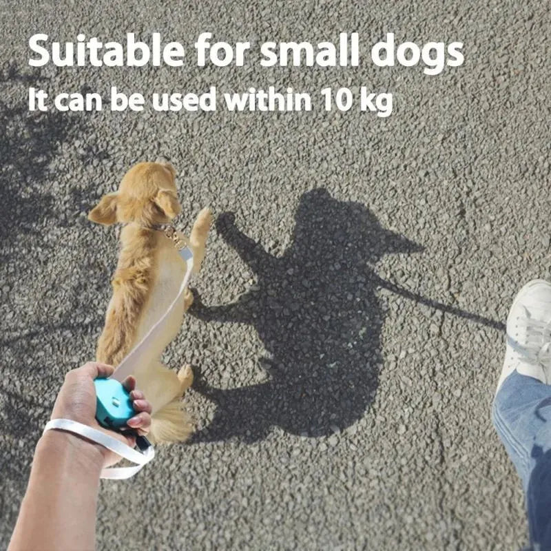 Retractable dog lead with 2m nylon tape, lock button, and non-slip handle in white, pink, or blue.