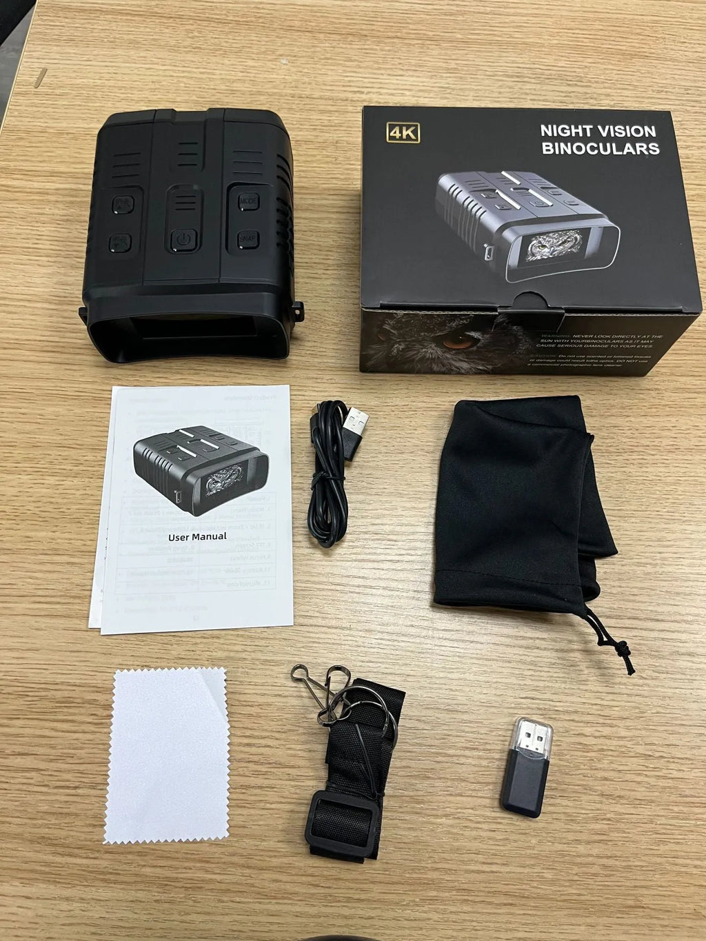 Night vision binocular Model N009 with large screen and WiFi function on a dark background