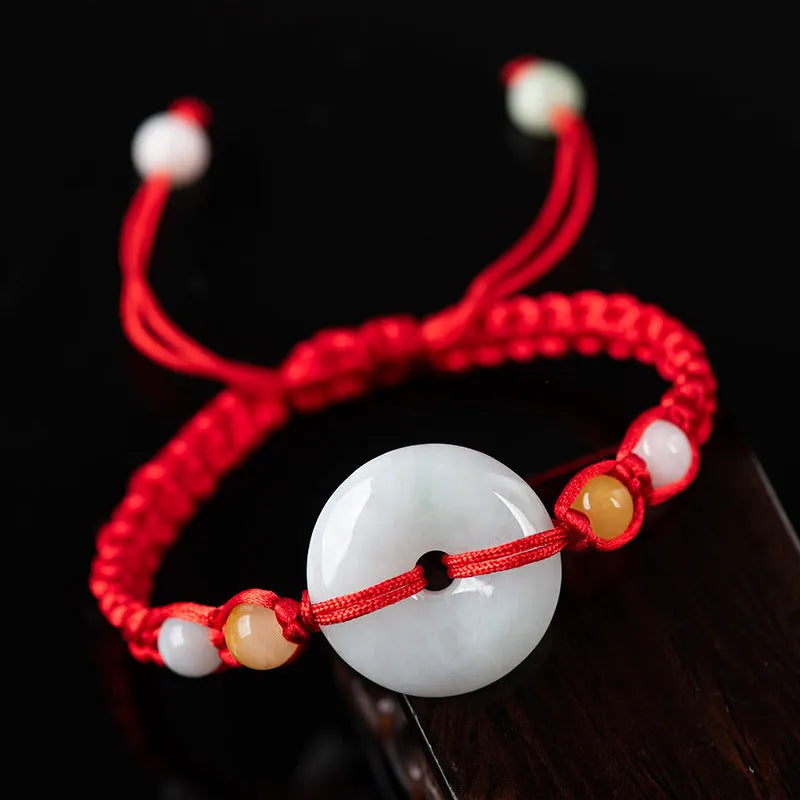 Round emerald-cut jade pendant on adjustable red rope bracelet with 14-20cm wrist fit