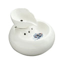 White porcelain leaf-shaped automatic cat water dispenser on floor