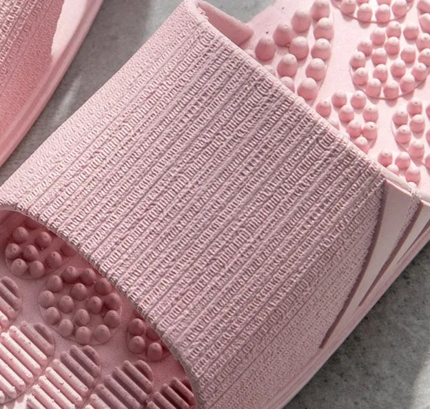 Reflexology acupressure slippers in EVA material with 3D massage particles, available in blue, grey, light blue, pink, purple
