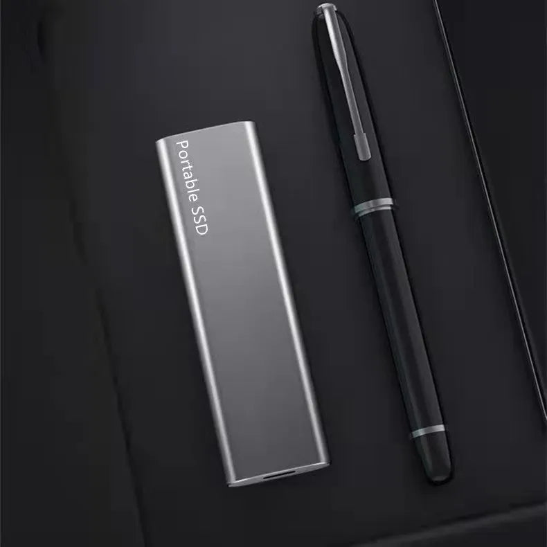 Ultra-thin metal external SSD portable hard drive in red, black, blue, or silver.