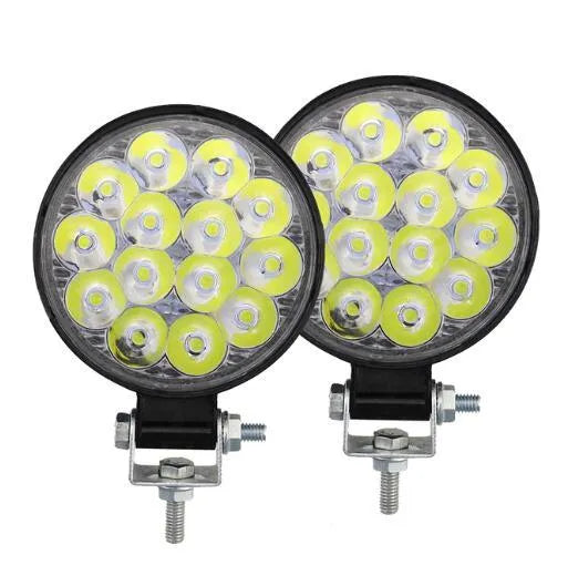 White aluminium LED work light unit with IP67 waterproof rating, suitable for car and off-road vehicle mounting.