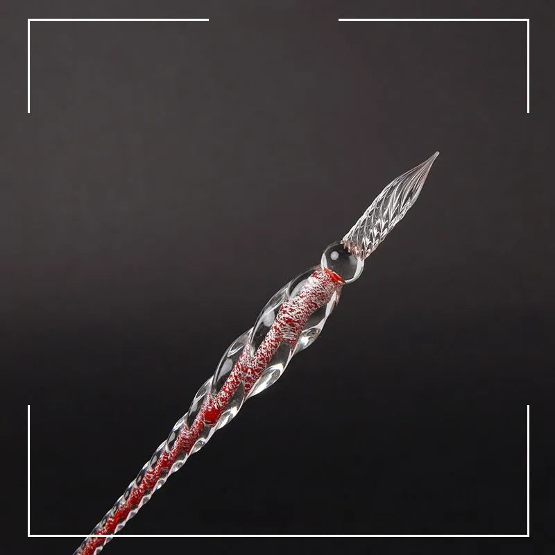 Transparent glass crystal pen with coloured ink dipped in water art effect showing coloured glaze decorative technique