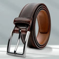 Men's brown genuine leather casual belt with an alloy buckle on a plain background
