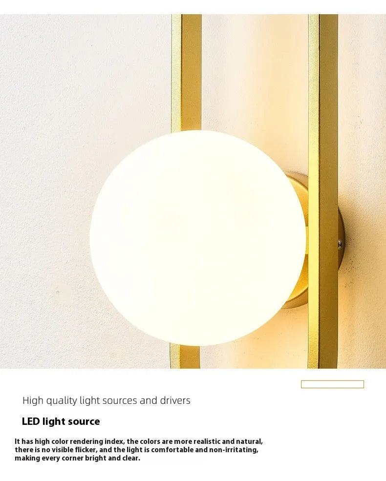 Minimalist wall-mounted lamp with glass shade and iron body in black or gold finish, showing 12W tri-colour LED light.