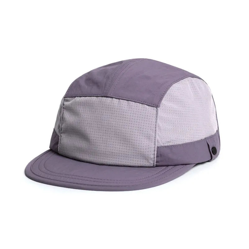 Breathable dome crown sun cap with a soft front tongue in Army Green colour on a wooden background.
