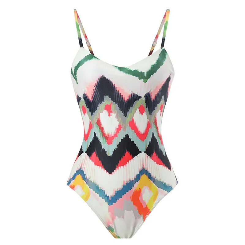 Women's two-piece swimsuit set with matching hip skirt in printed pattern