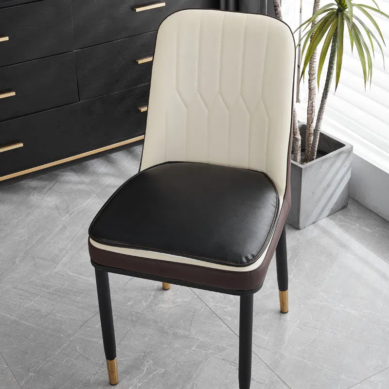 Leather horseshoe-shaped seat cushion with non-slip base in beige colour