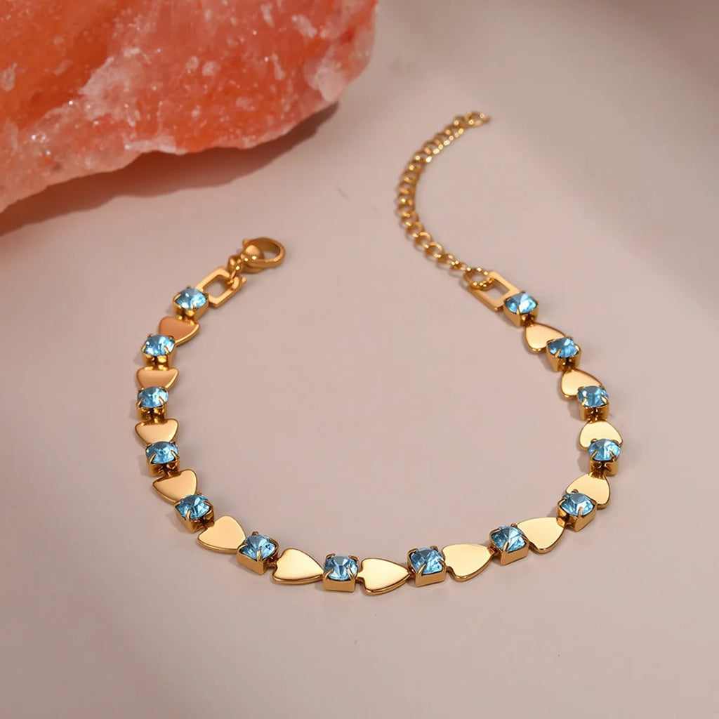 Temperamental women's stainless steel bracelet with 18K gold electroplating and geometric zircon accents in multiple colours