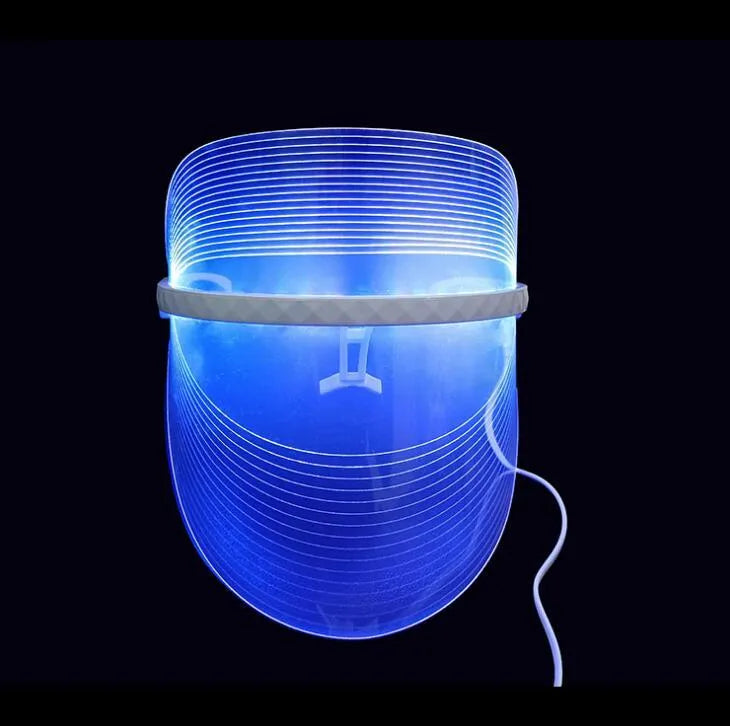 Transparent ABS LED light therapy face mask with red, yellow, and blue lights for home skin care