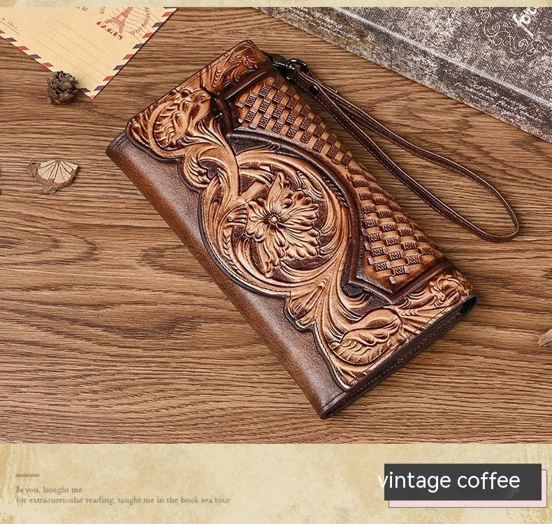 Women's tri-fold leather wallet with embossed floral pattern showing retro brown colour and open 19.5cm dimensions
