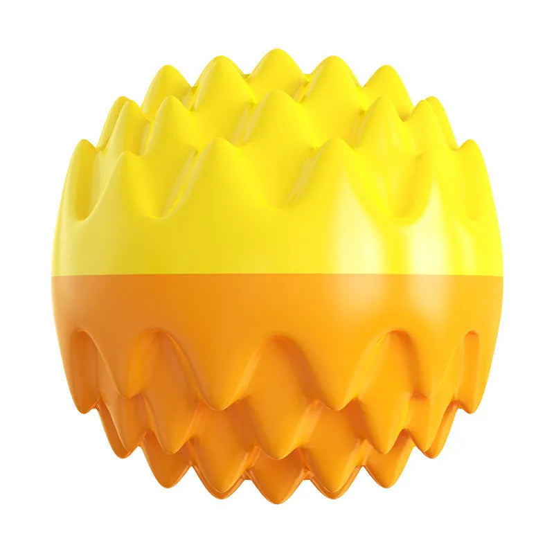 Blue squeaky rubber dog ball with spiked surface for dental cleaning and aggressive chewers