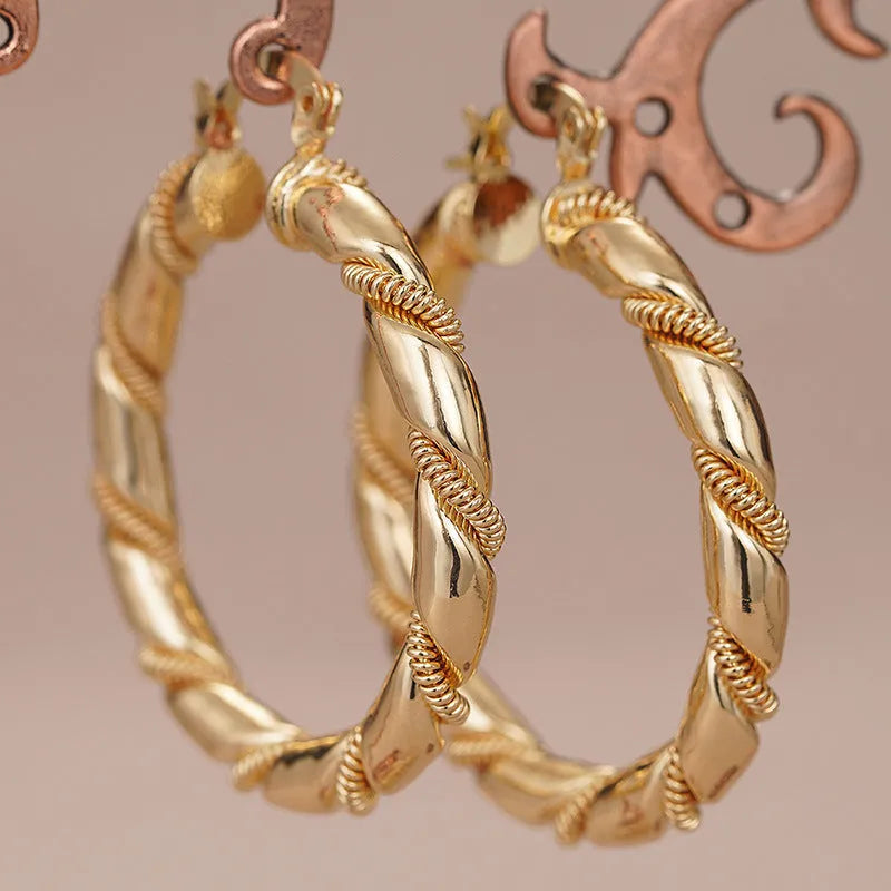 Geometric copper ear clips with ring and line design in golden colour for women