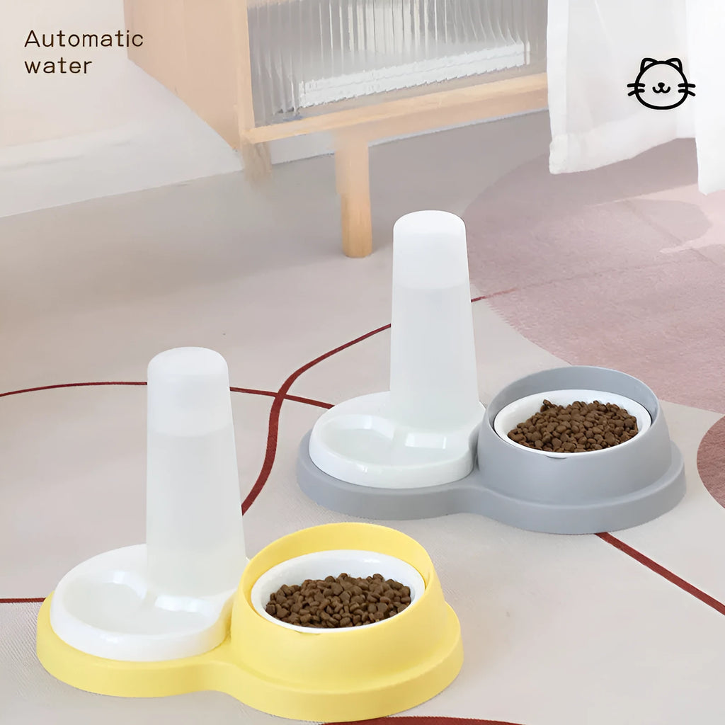 Grey and yellow double pet feeding bowl with ceramic food bowls and stainless steel water dish on a PP plastic base.