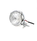 Retro black electroplated Harley headlight for cars with a halogen bulb.