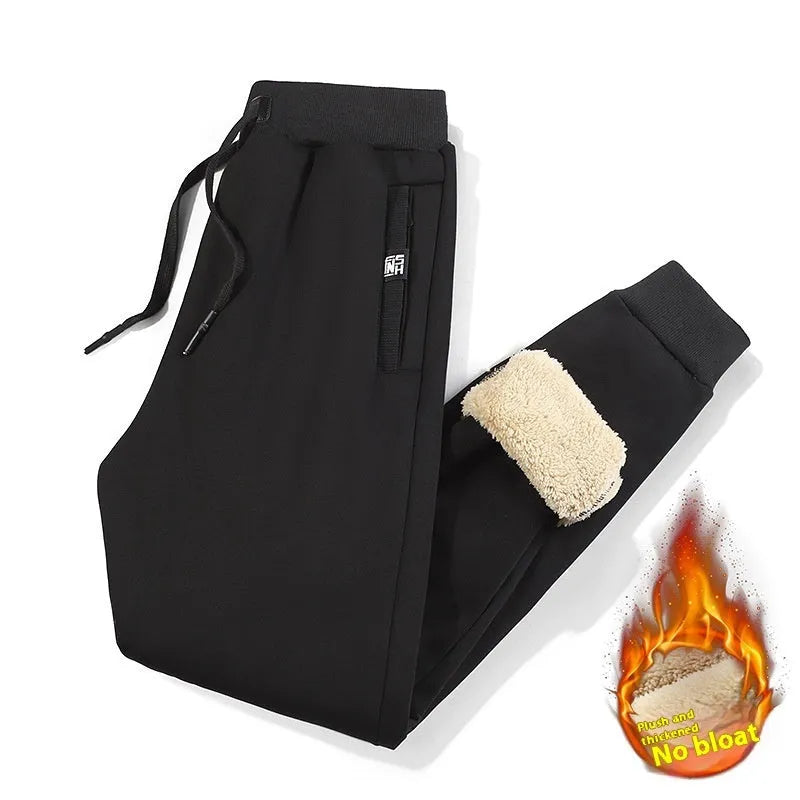 Men's grey fleece-lined cotton track pants with oversized fit and straight leg design