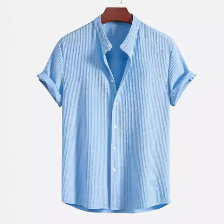Men's loose fit short sleeve casual shirt in a solid colour on a hanger