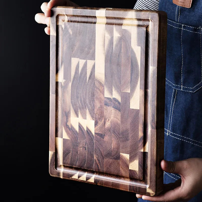 Brown parquet-pattern solid wood chopping board with 3cm thickness on a kitchen counter.