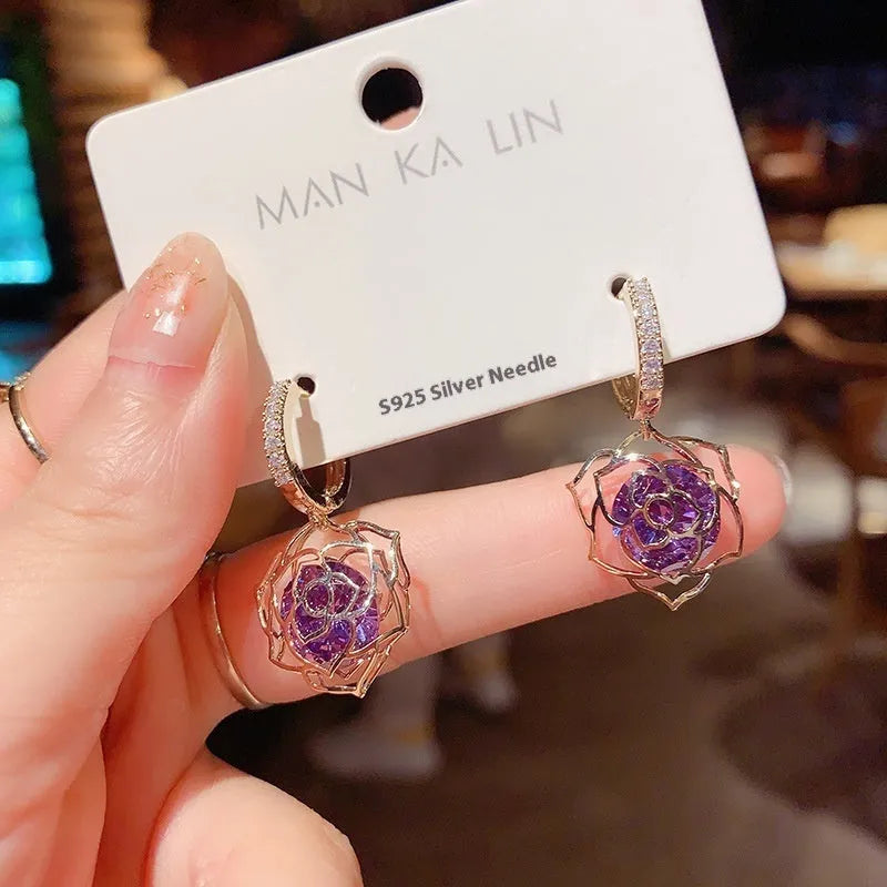 Geometric copper zircon earrings with rose design element in electroplated finish