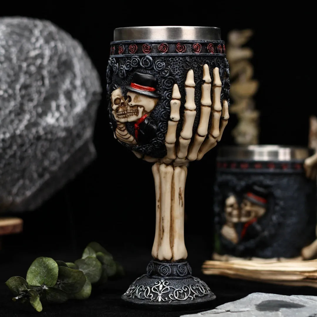 Stainless steel red wine glass with resin skeleton couple decoration, 200ml capacity