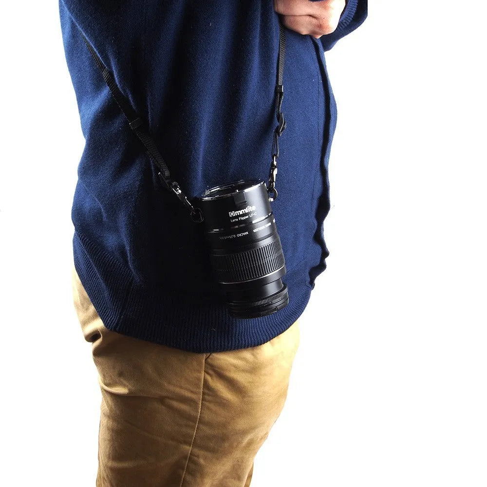 Aluminum alloy dual camera lens flipper holder with cotton strap for Canon, Nikon, and Sony cameras.