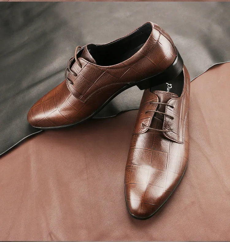 Men's black checkered derby leather shoes with a pointed toe and rubber sole.